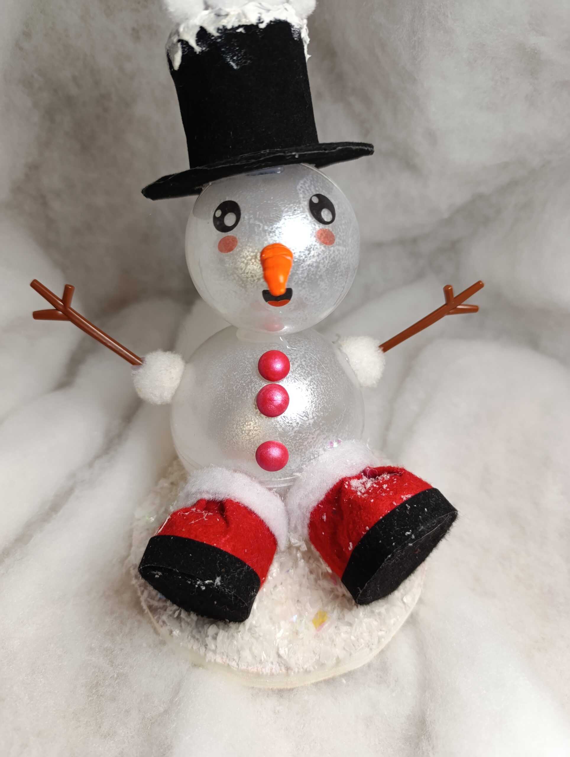 IMG_20251209_095010 Neigépince, bonhomme de neige assis au chapeau haut de forme